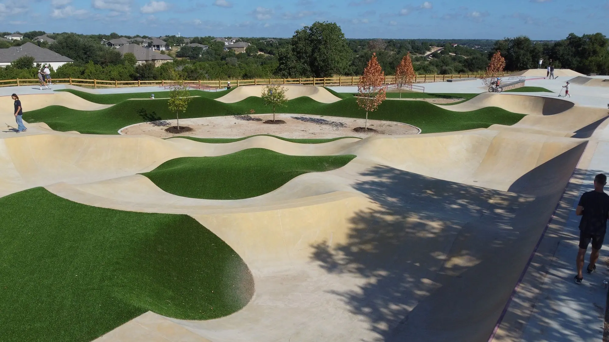 SPA Skateparks - Georgetown Garey Park Pump Track Synthetic Grass Landscape